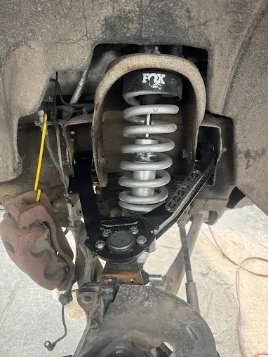 A FOX coilover suspension component on a truck